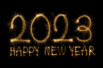 Happy New Year 2023. Sparkling burning text Happy New Year 2023 isolated on black background....