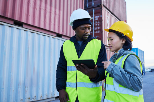 Logistics, Supply Chain And Shipping Team With Tablet Planning Delivery Schedule Online At A Port. Cargo Or Contractor In Teamwork Working With Technology And Container For Transport Or Export
