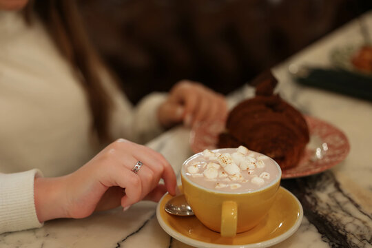 yellow cup with cocoa and mashmellow. High quality photo