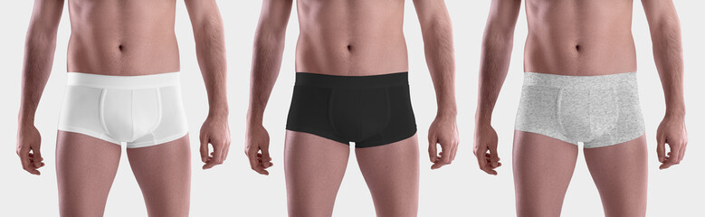 Mockup of white, black and heather male boxers, brief underwear, isolated on background.