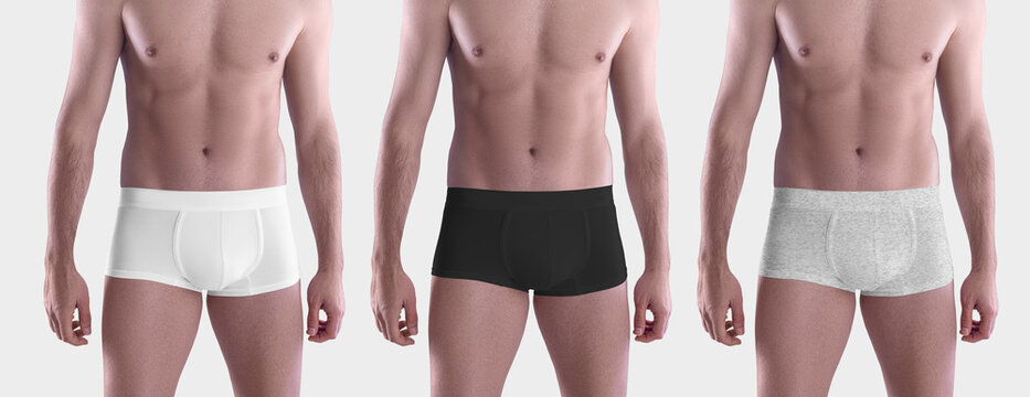 Mockup of white, black and heather men's boxers on sportswear, brief underwear close-up, isolated on background.