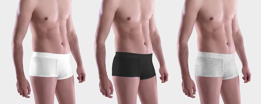 Mockup of white, black and heather trunks on a guy, brief underpants close-up, for design, pattern, advertising.