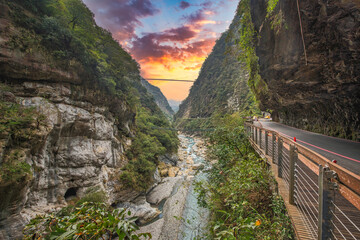 Beautiful sunset over a turquoise river crossing a deep gorge at the Taroko National Park in Taiwan
