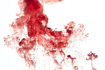 Abstract background picture with red paint dissolving in water