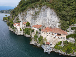 Drone view at the monastery of Santa Caterina del Sasso on lake Maggiore, Italy