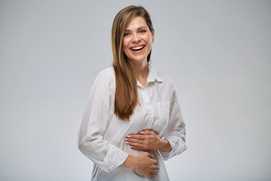 Happy healthy woman has no stomach problems. isolated portrait on white.