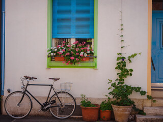 Buildings in the city centre of Basel , Switzerland. Colorful house with bike near entrance
