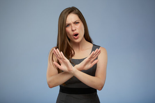 Shouting woman declines offer with crossed hands. Please do not do that.
