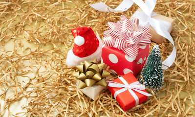 Christmas gold background, gift box presents and decoration with copy space