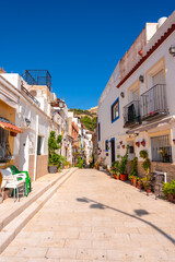 Fototapeta na wymiar Beautiful white houses in the Santa Cruz neighborhood in Alicante. Valencian Community
