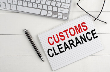 text CUSTOMS CLEARANCE on keyboard on white background