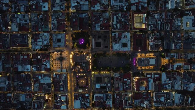 Top view above the Guadalajara Cathedral and the Plaza de la Liberaci&oacute;n , evening in Mexico - cenital, aerial shot