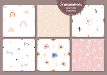 Hand drawn seamless patterns set in Scandinavian style. Boho vector backgrounds with rainbow, polka dot, sun, flowers, hearts and trees. Cute repeating print for baby girls nursery, fabric, wallpaper