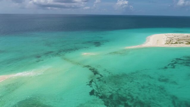 Cayo de Agua Los Roques island, drone shot without typical white sand road