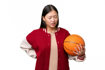 Young basketball player asian woman over isolated background suffering from backache for having made an effort