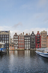Dancing Houses Damrak Amsterdam during the day Netherlands Holland