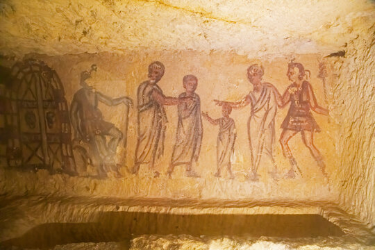 Ancestors painted in a tomb from etruscan necropolis of Tarquinia, Italy
