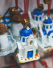 View of traditional tourist souvenirs and gifts from Athens, Attica, Greece with fridge magnets with text 