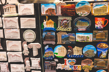 View of traditional tourist souvenirs and gifts from Athens, Attica, Greece with fridge magnets...