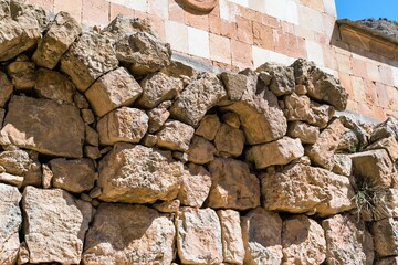 Stonework of an old monastery wall in Armenia.