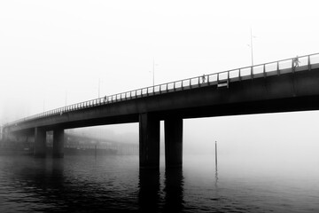 Misty morning on Seine river and  Mandela Bridge in Paris suburb. Ivry-sur-Seine city
