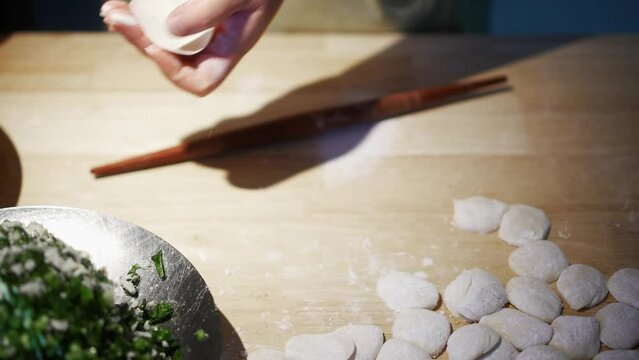 people making dumpling