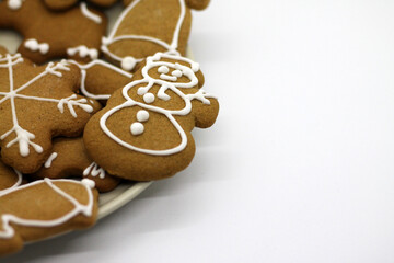 Christmas gingerbread handmade on white background.