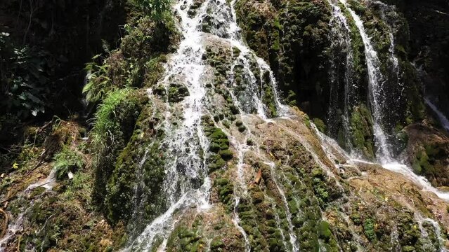 Camera flying over a waterfall in Kupang, East Nusa Tenggara, Indonesia. Relax photo first. Air drones.