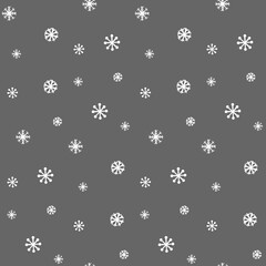 Fototapeta na wymiar Seamless background with snowflakes on grey. Festive Christmas or New Year wrapping paper.