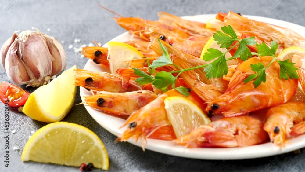 Wall mural plate of shrimp with lemon and herbs