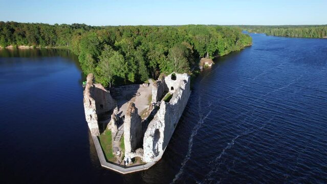 Scenic drone shot of Koknese castle ruins next to river Daugava, Latvia