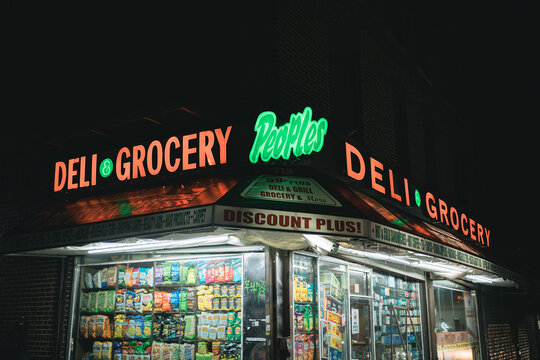 Peoples Deli & Grocery Sign At Night, In Crown Heights, Brooklyn, New York