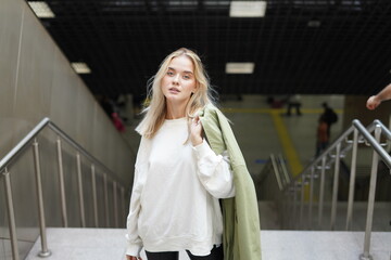 Beautiful Russian girl at the metro station