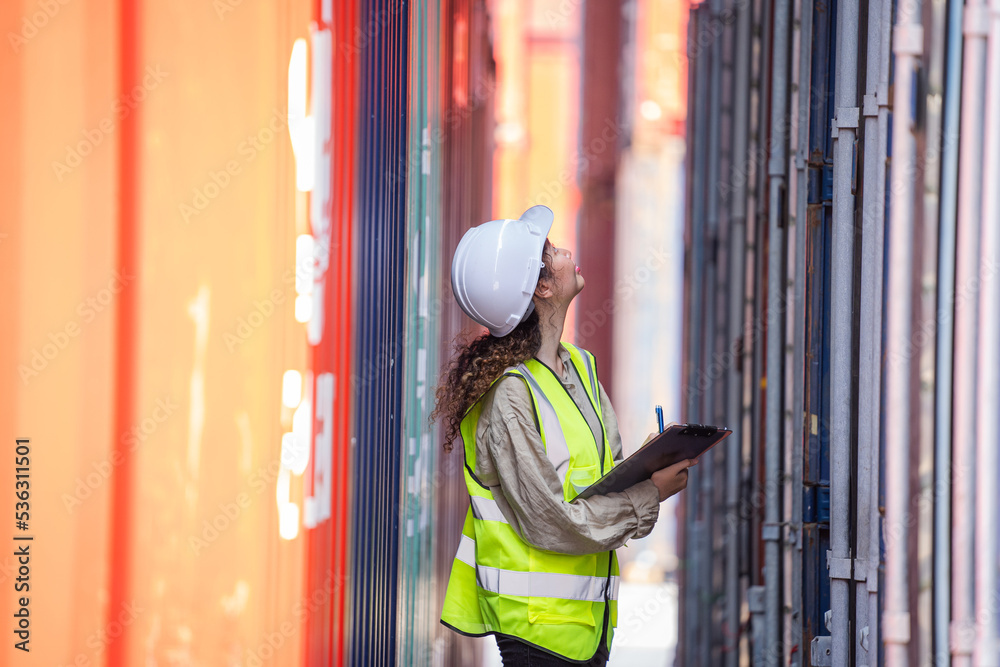 Poster Inspector checking container yard Organising stock to pack into containers,Logistic shipping yard business,Unload and loading variety of products to and from container
