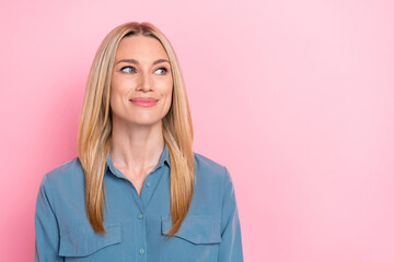 Closeup photo of young attractive cute businesswoman wear blue shirt dreamy look empty space new promo vacancy employer isolated on pink color background
