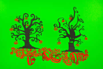 Halloween Tree with Orange Pumpkins on the green screen background.
