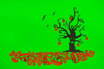 Halloween Tree with Orange Pumpkins on the green screen background.