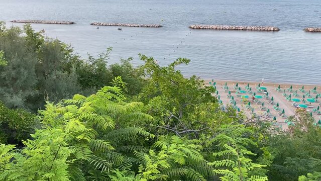 Gabicce, Pesaro Urbino, Italy . Aerial view of the beach of Gabicce Mare from Monte San Bartolo promontory.  Concept for summer, beach, Italy, nature, fun, holydays, relax