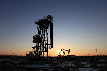 Tower pumping unit in the evening