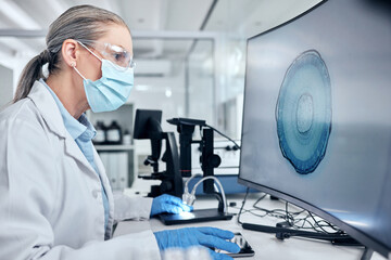 Scientist with computer screen, digital microscope and ppe analysis of bacteria for virus test,...