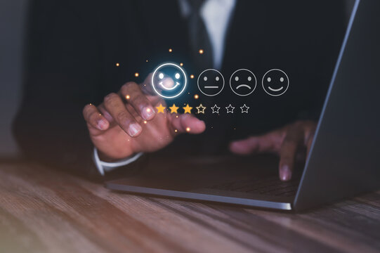 Businessman Virtual Finger Taps On Happy Smiley Face Icon. High Service Satisfaction Customer Service, Business Concept, Ratings Are Very Impressive.