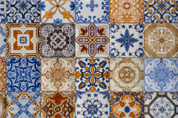 Old tiles mosaic, background from home colorful decorative art tiles, pattern in oriental style background design. Idea for decoration of space or wallpaper for advertising