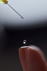 Doctor doing stem cell therapy on a patient's elbow after the injury. Treating knee pain with...