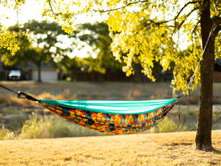 Colorful Hammock in the City near the River Stream Sunny Autumn Day.