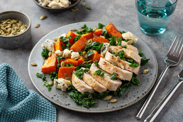 Fototapeta na wymiar chicken breast with sweet potato, blue cheese and kale. healthy lunch