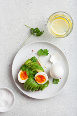 breakfast avocado sandwich with boiled egg