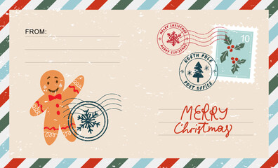 Christmas envelope with stamps, seals, gingerbread man and inscriptions Merry Christmas.