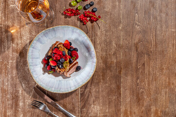 Duck breast with foie gras and berries