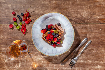 Duck breast with foie gras and berries