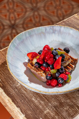 Duck breast with foie gras and berries